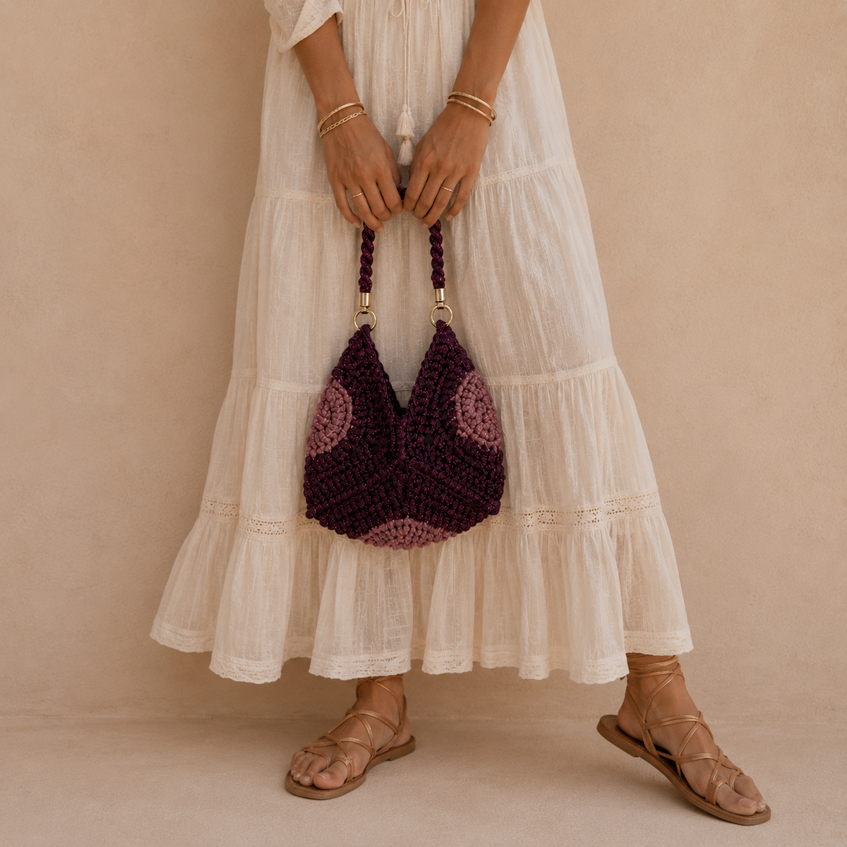 Handgemaakte clutch tas Formentera in burgundi en oudroze met gevlochten handvat.